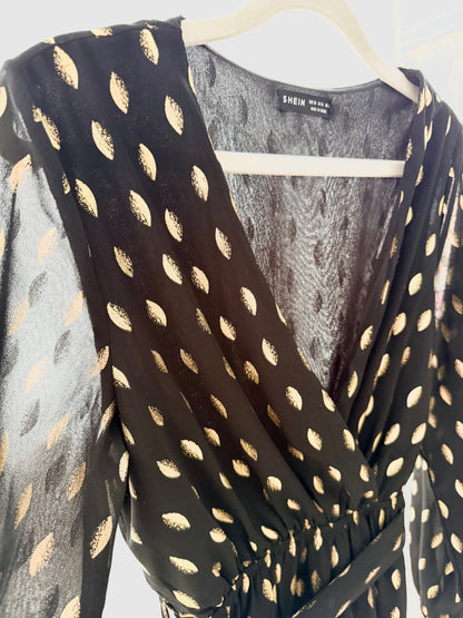 Klänning i polkadot guld