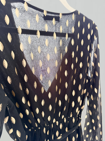 Klänning i polkadot guld
